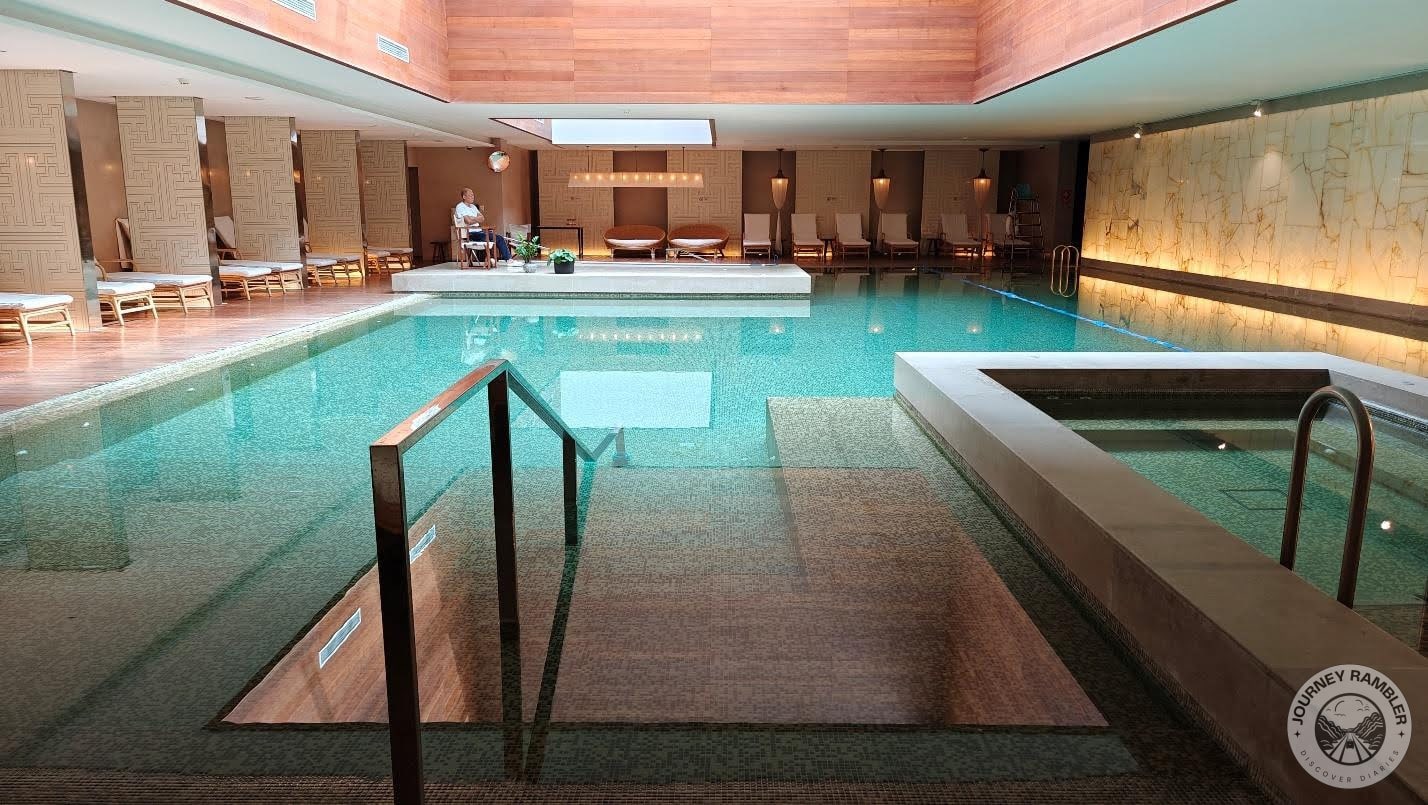 floor of the pool was tiled in blue and green