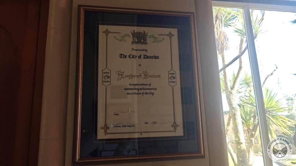 given to Margaret Barker by the City of Dunedin in recognition for her work in reconstructing Larnach Castle