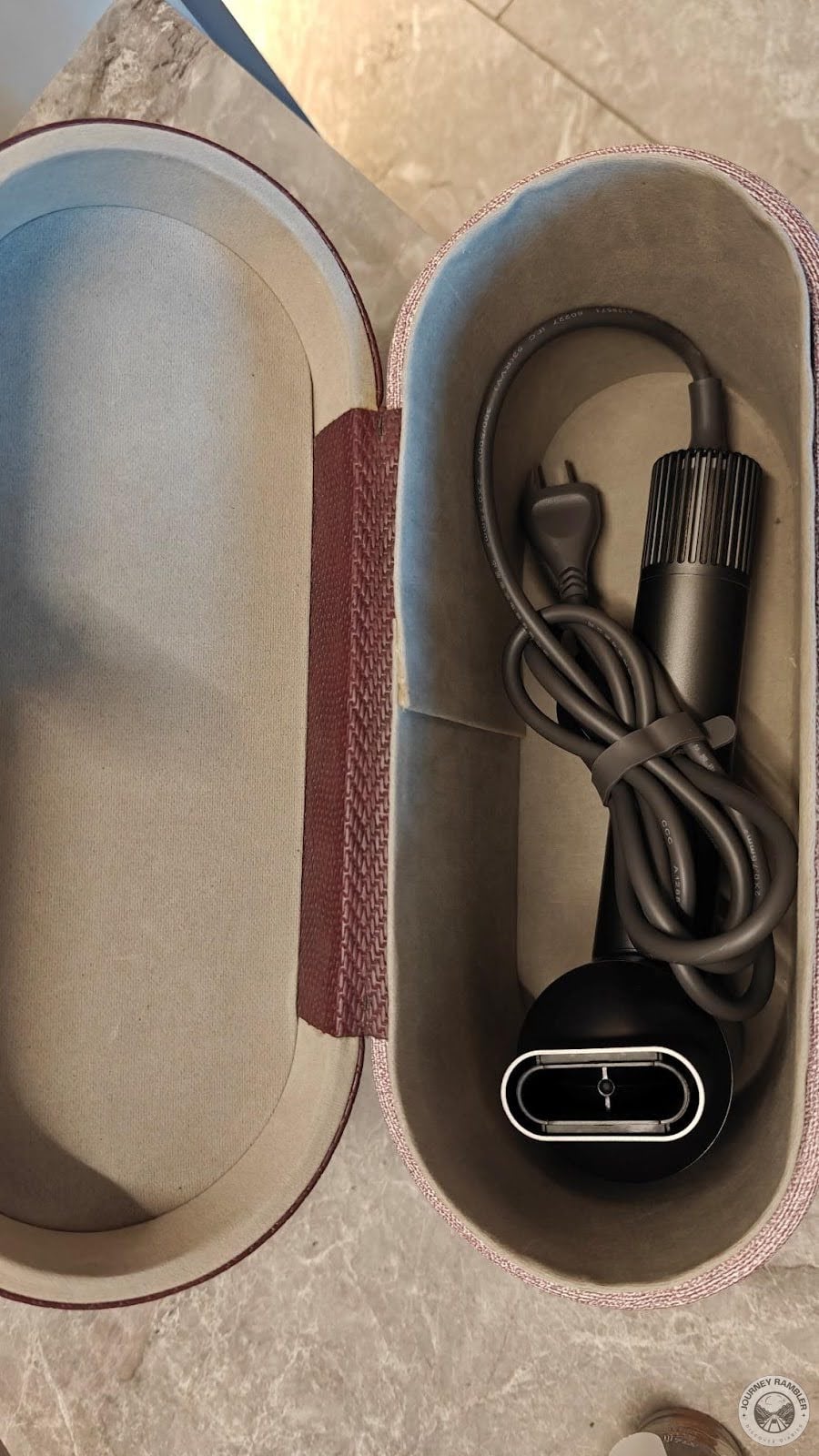 hairdryer kept in a neat little box