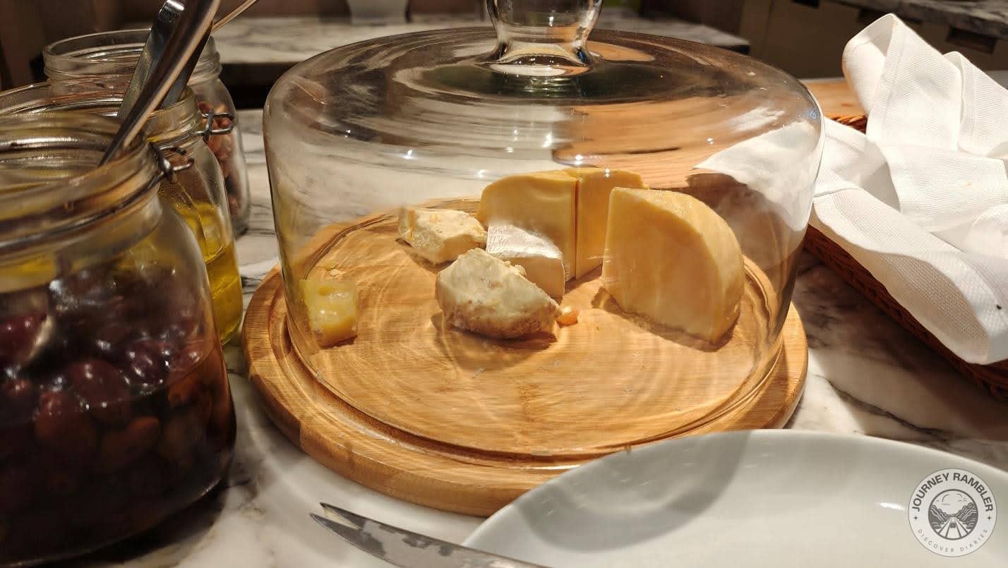 hard cheese was kept covered by glass