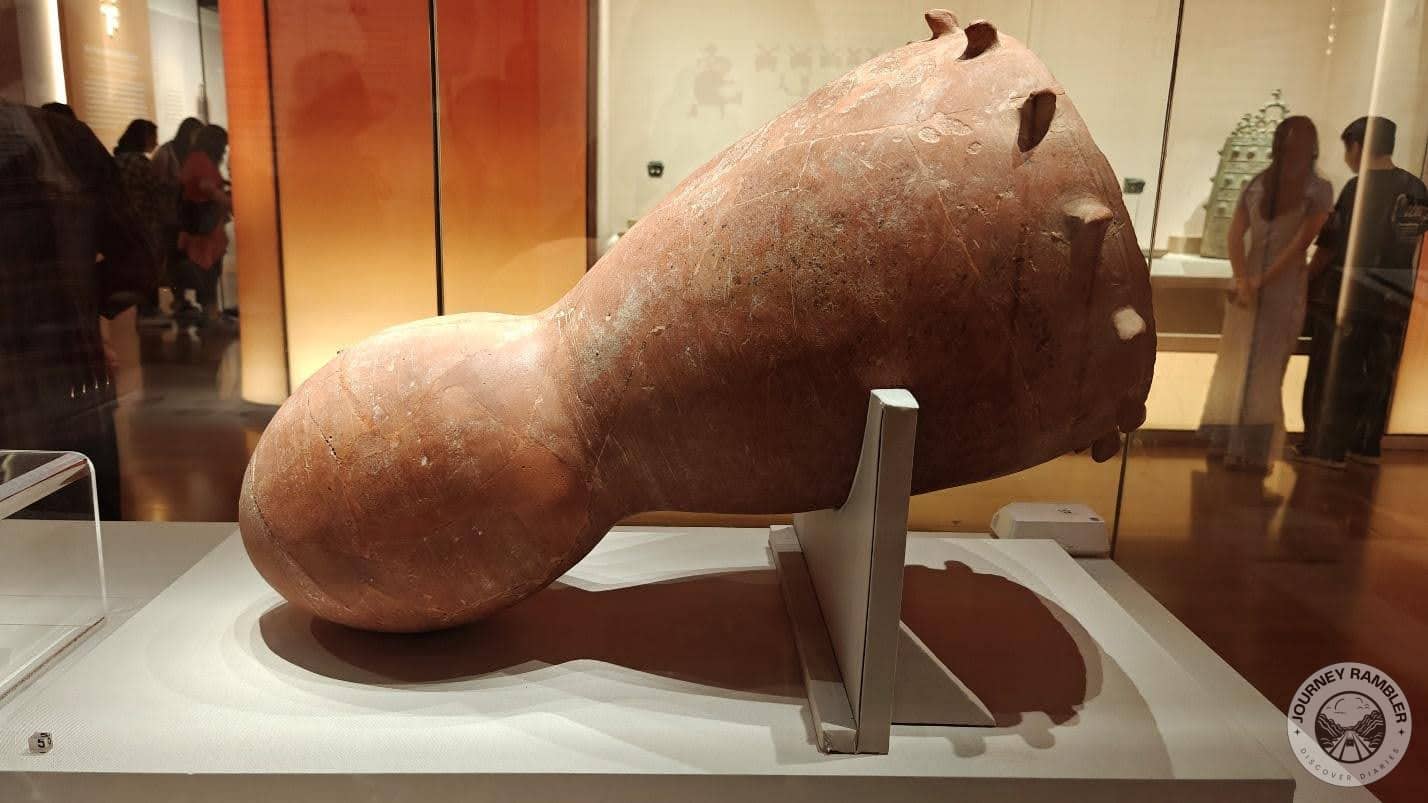 huge instrument that looked like a drum in the middle of the room