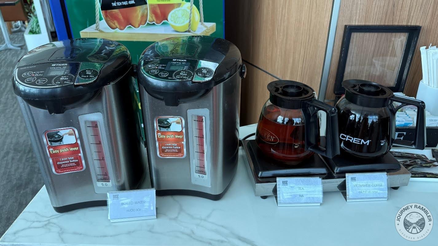 kettles filled with tea and Vietnamese coffee