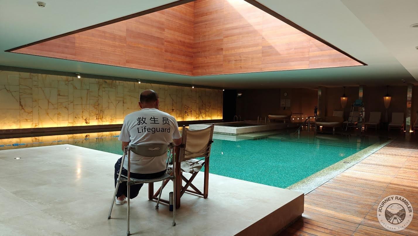 lifeguard sitting in the center of the room