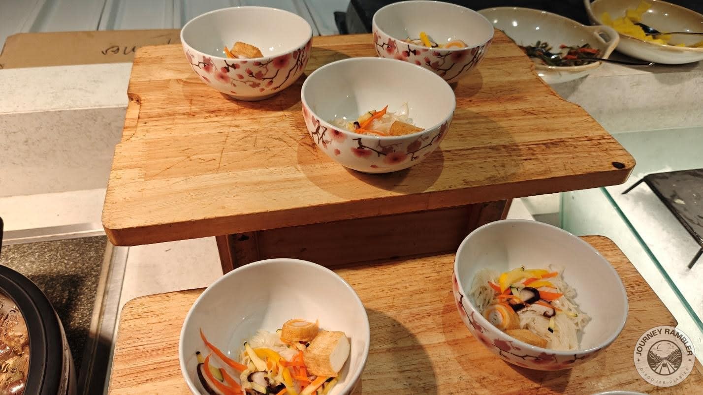 little bowls with veggies and tofu