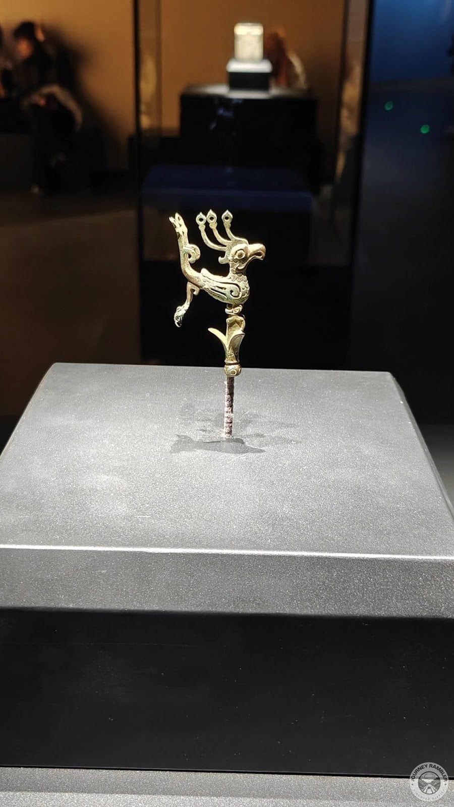 little peacock shaped artifact