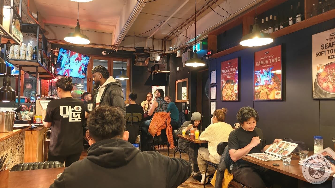 lot of people were sitting at the tables