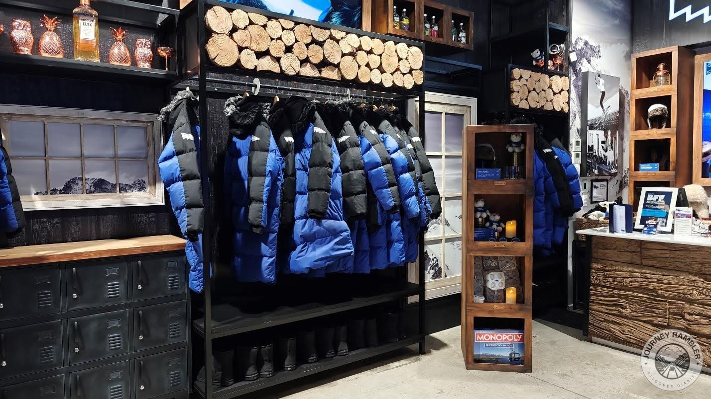 lots of bottles and glasses arranged on shelves