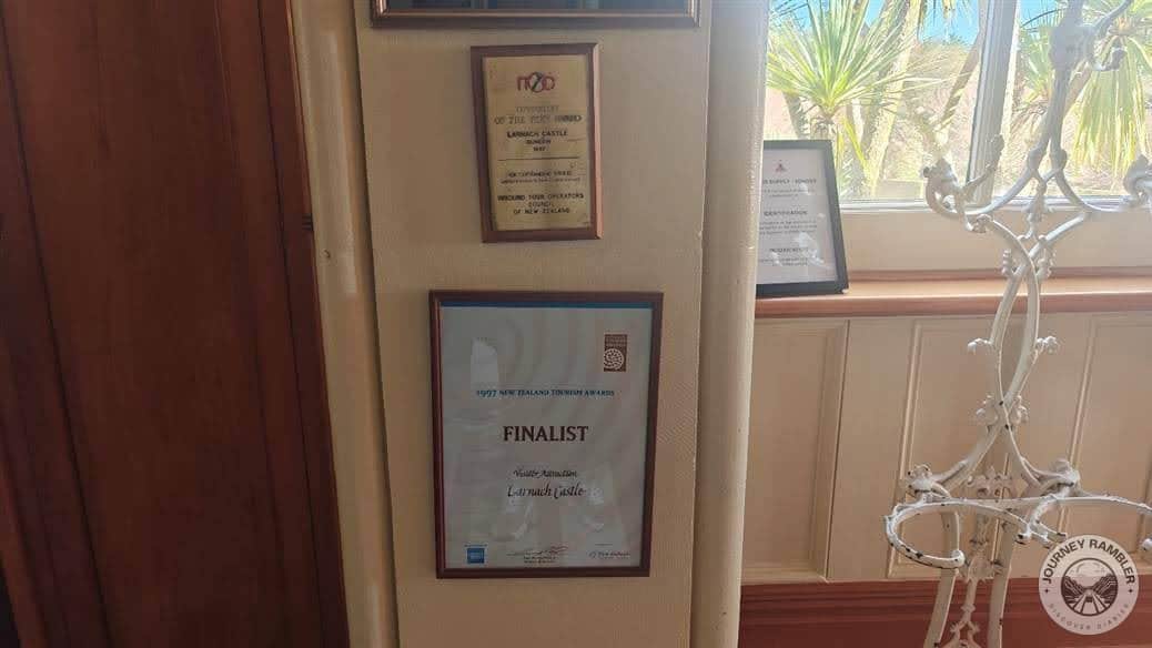 numerous plaques and certificates on the walls