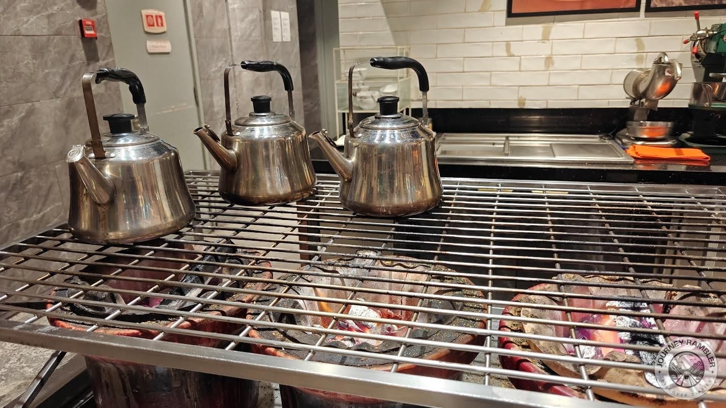 pots of warm tea and coffee