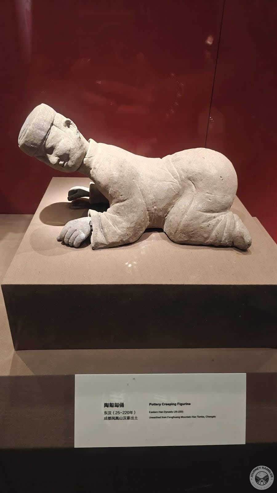 pottery creeping figurine