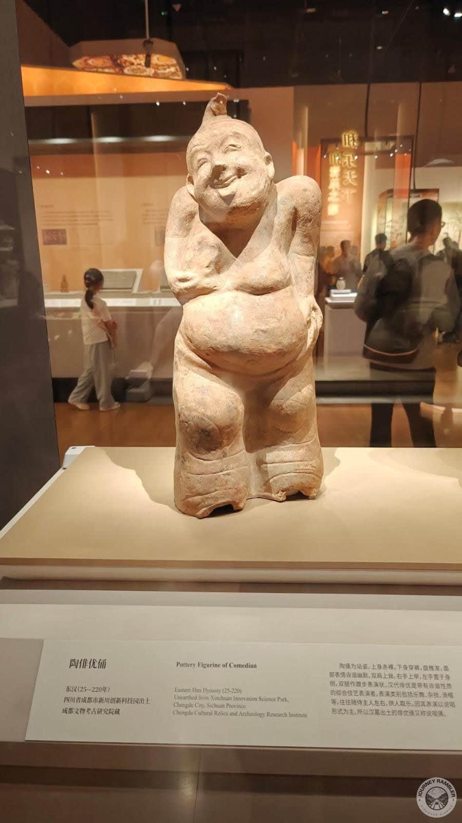 pottery figure of a comedian