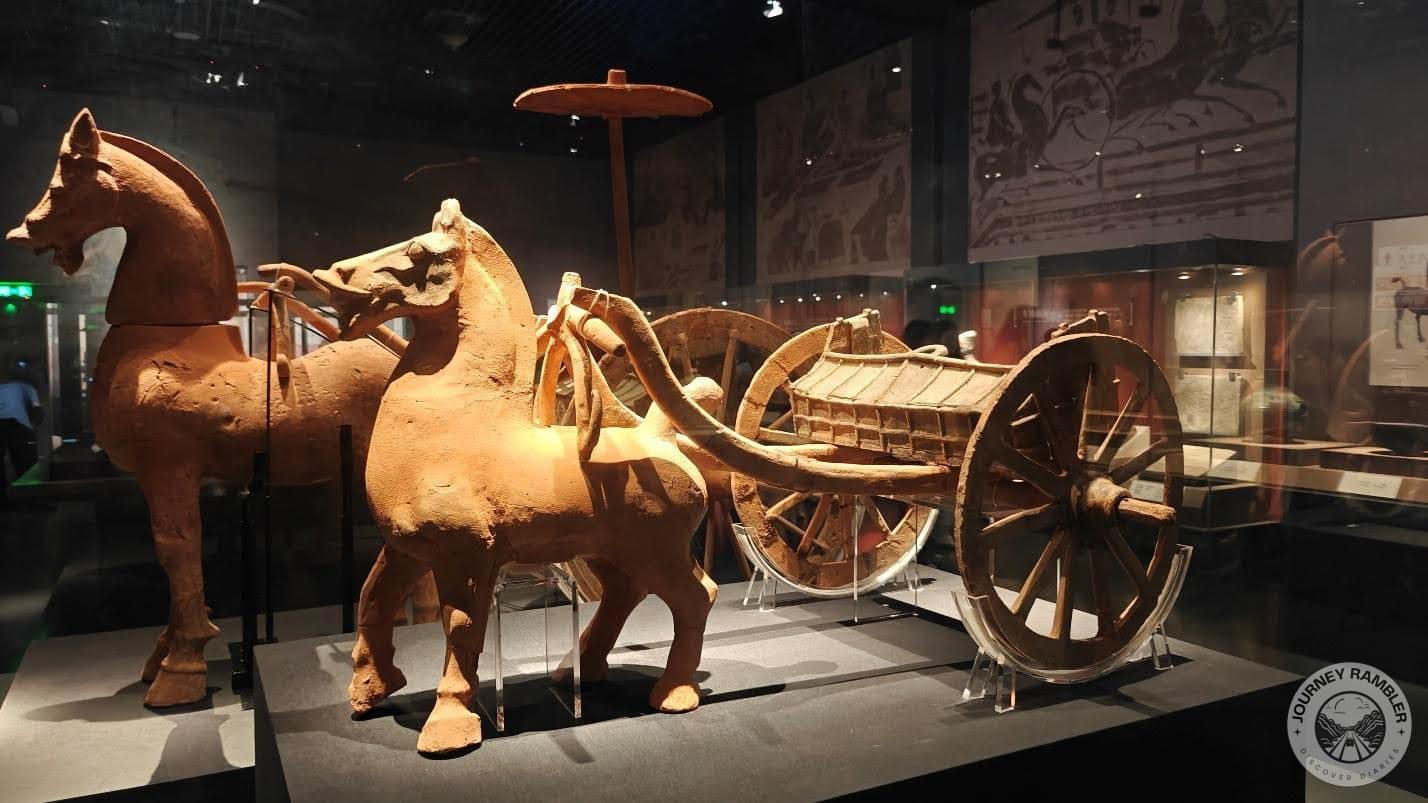 pottery replica of a horse drawn carriage