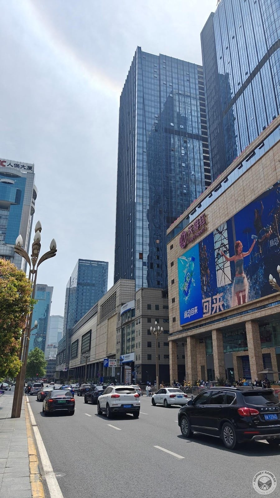 rainbow behind one of the skyscrapers