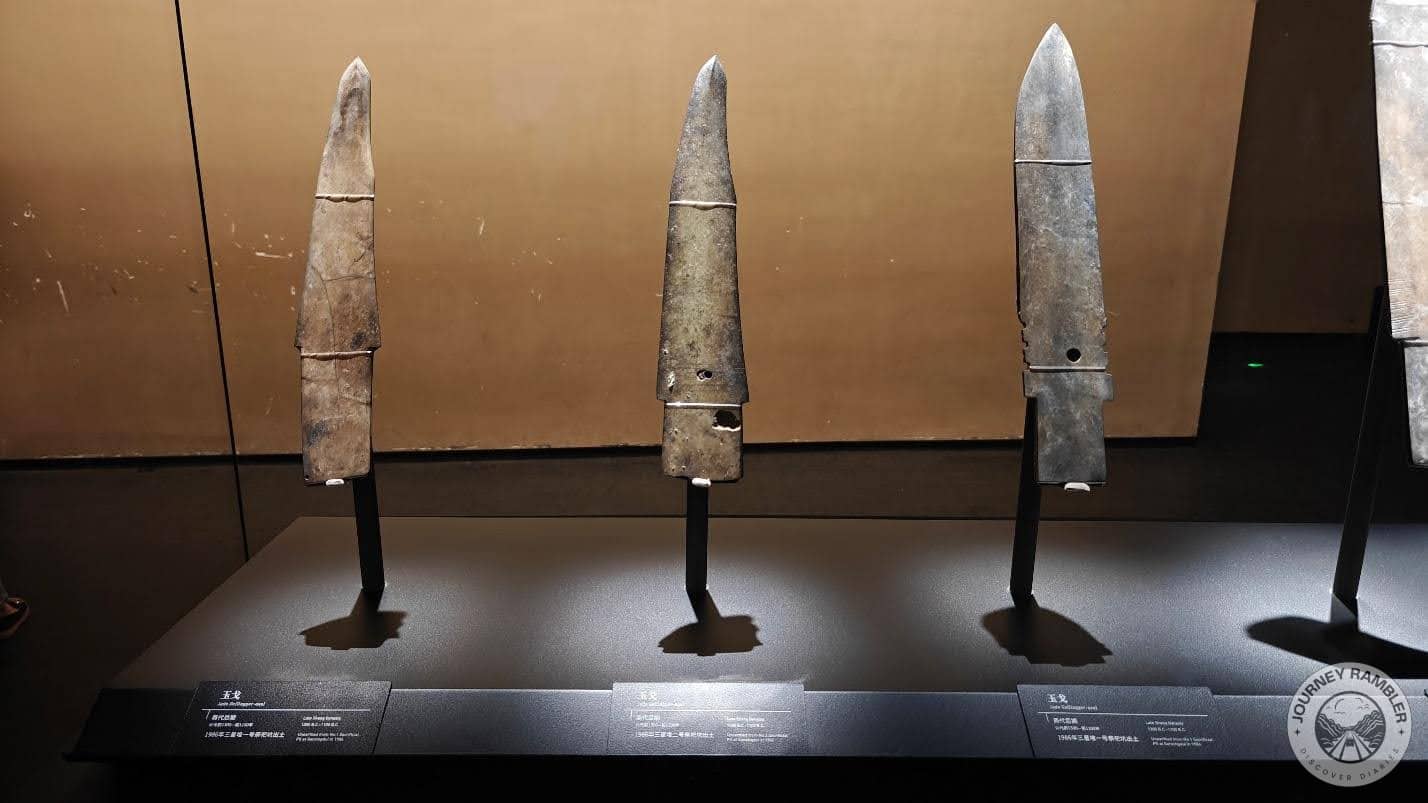 row of jade daggers without any handles