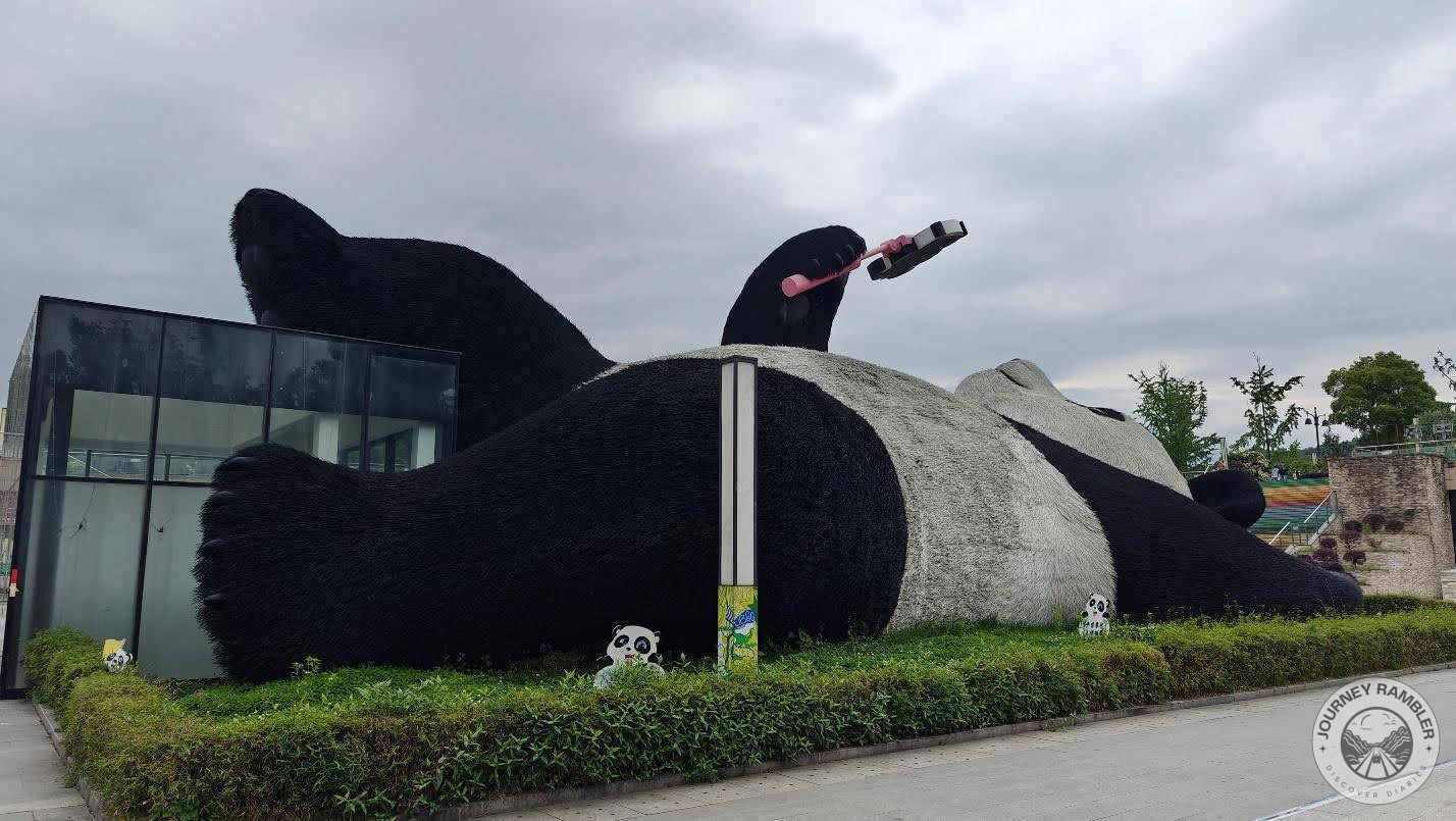 signboards with pandas on it all around the giant Selfie Panda