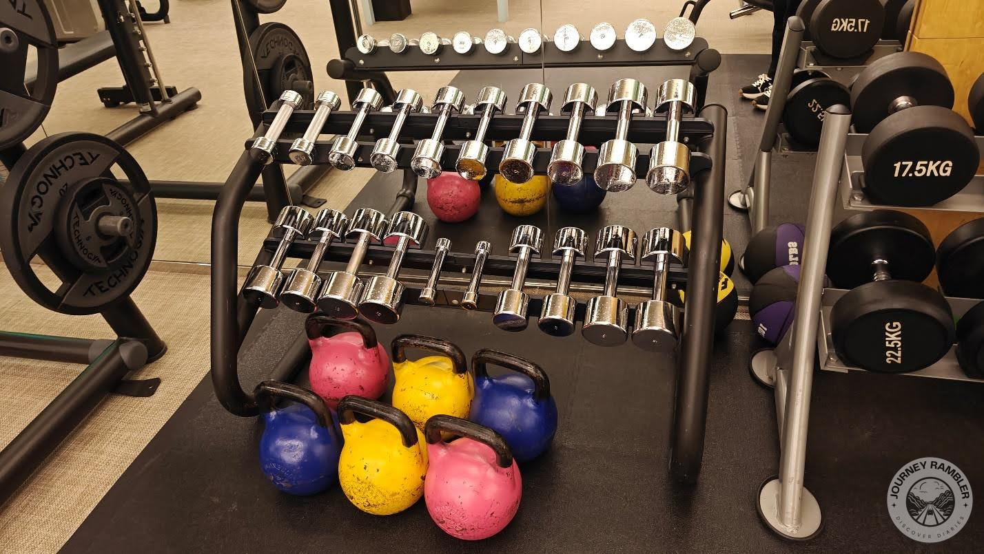 smaller weights and some old, faded looking kettlebells