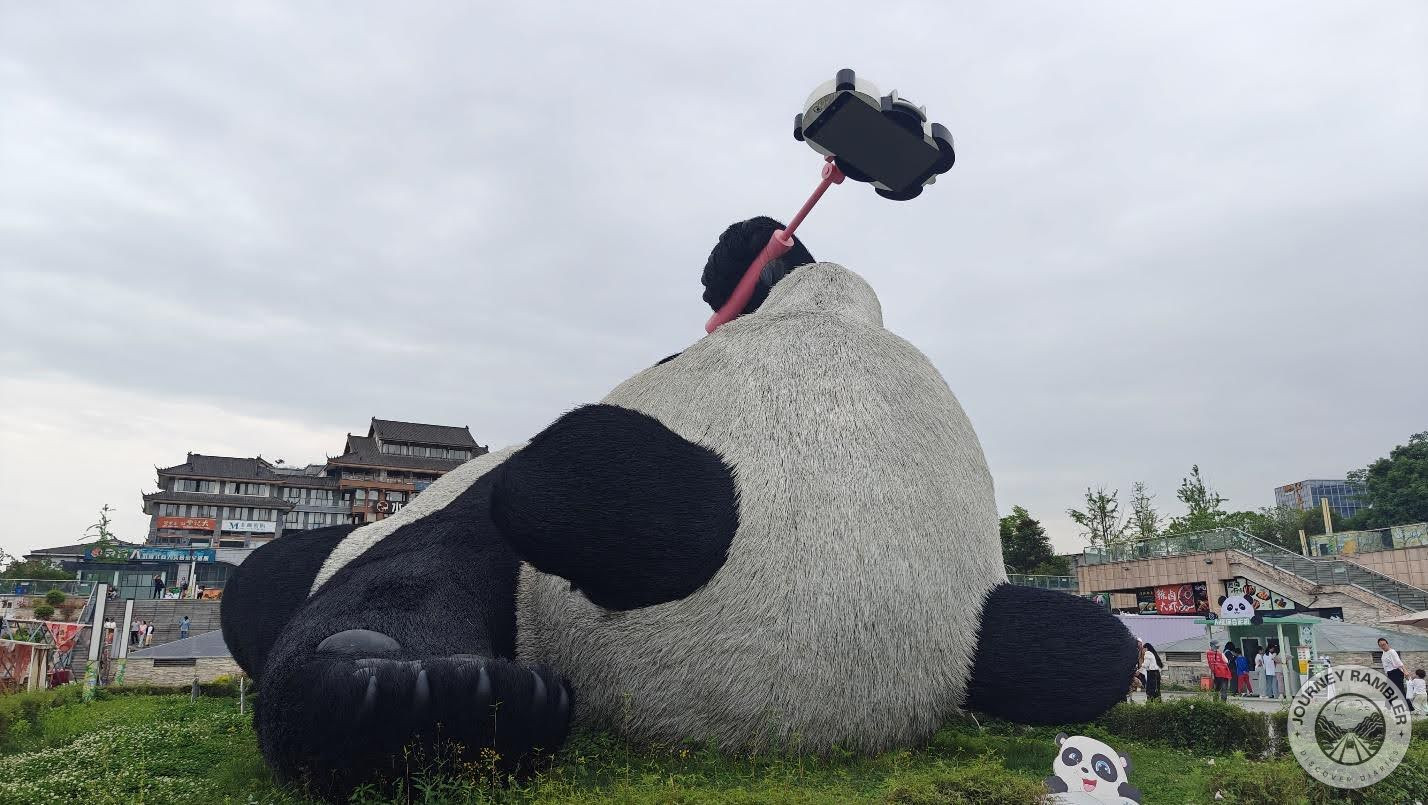 smartphone and the pink selfie stick that the panda was holding were huge