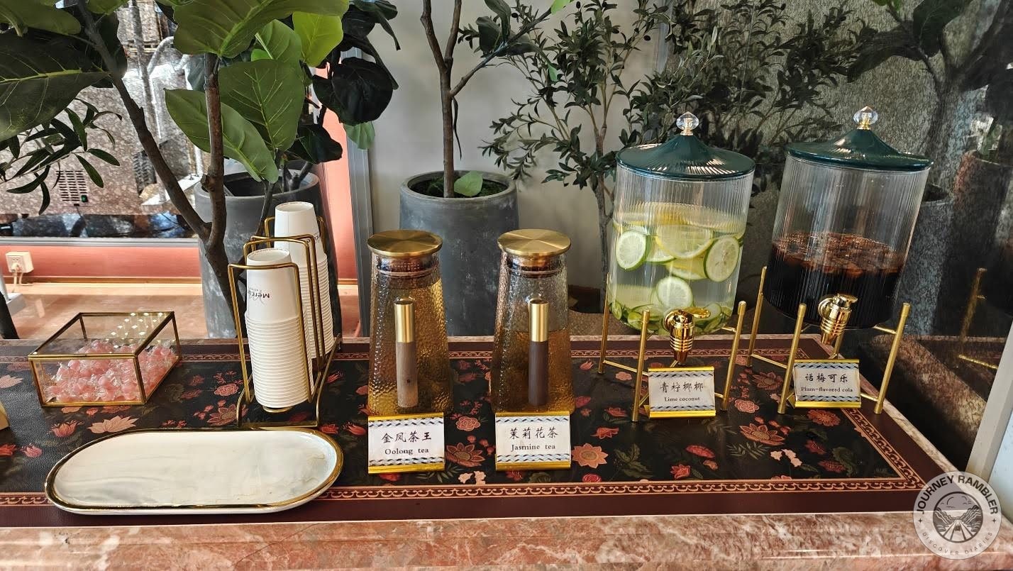 some containers and jars of tea and flavored water