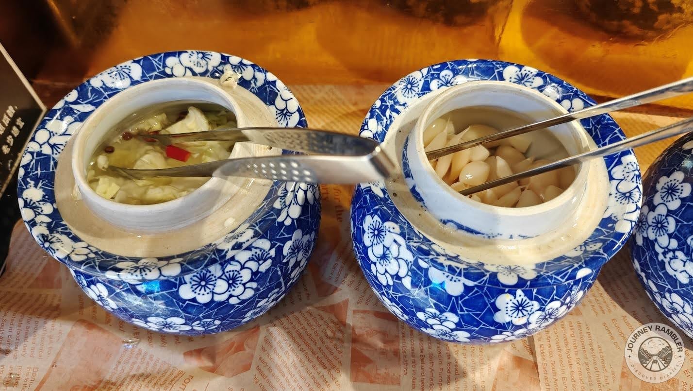 special Sichuan pickles were served in little blue and white porcelain jars