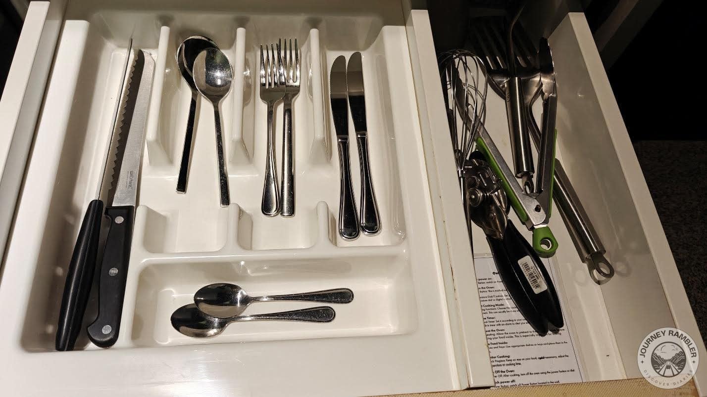 spoons, forks, knives and other kitchen utensils like whisks and spatulas