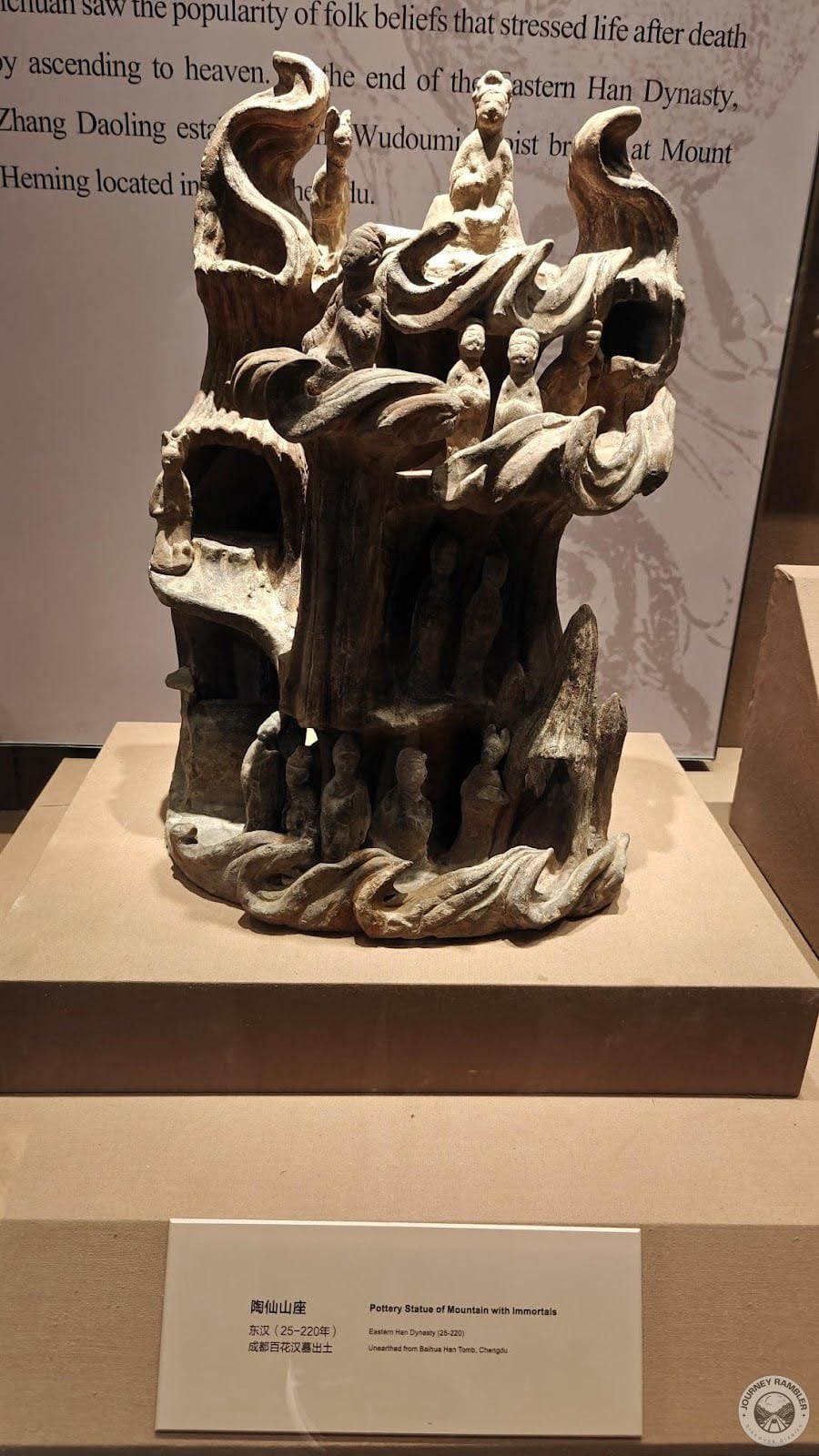 statue of a mountain with immortals