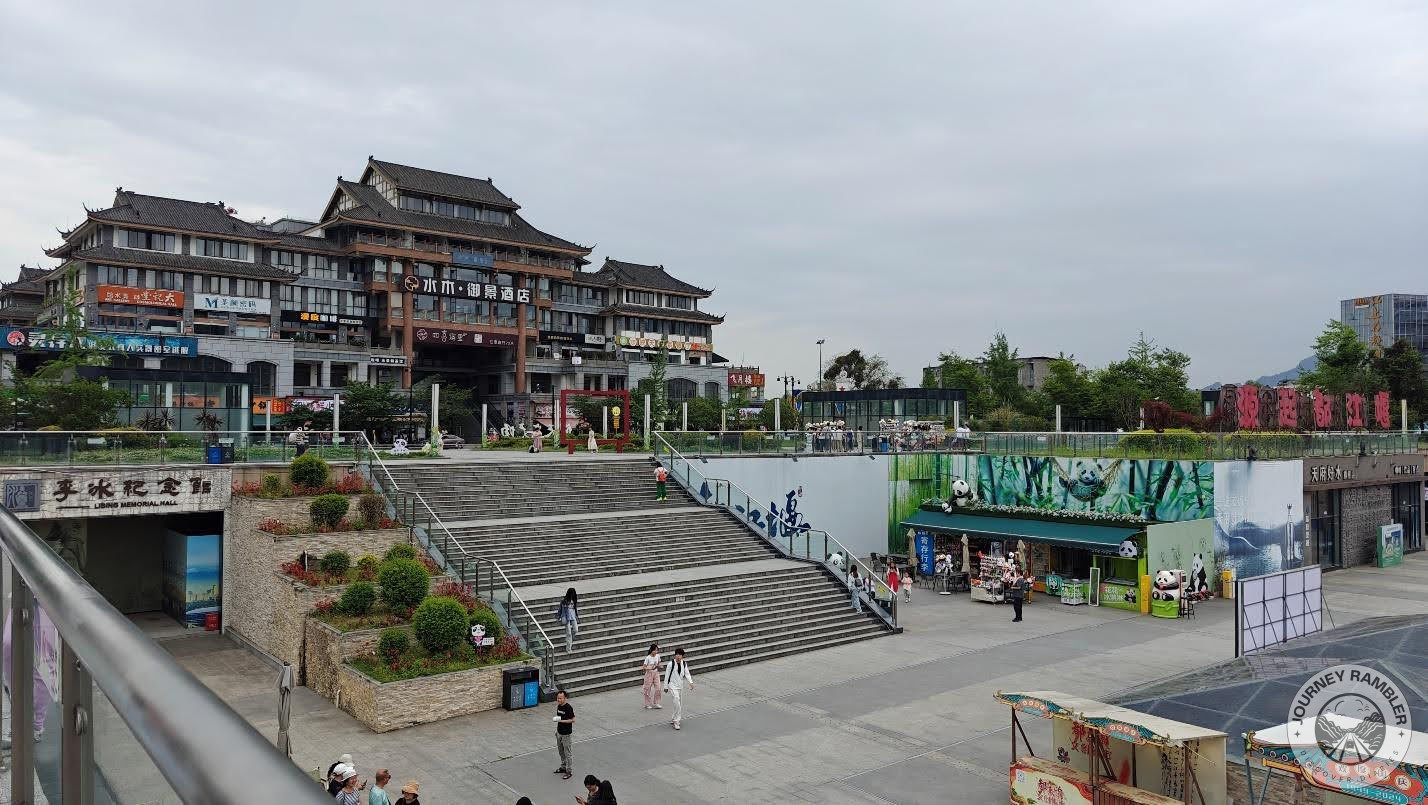 steps all around and some traditional looking buildings on one side