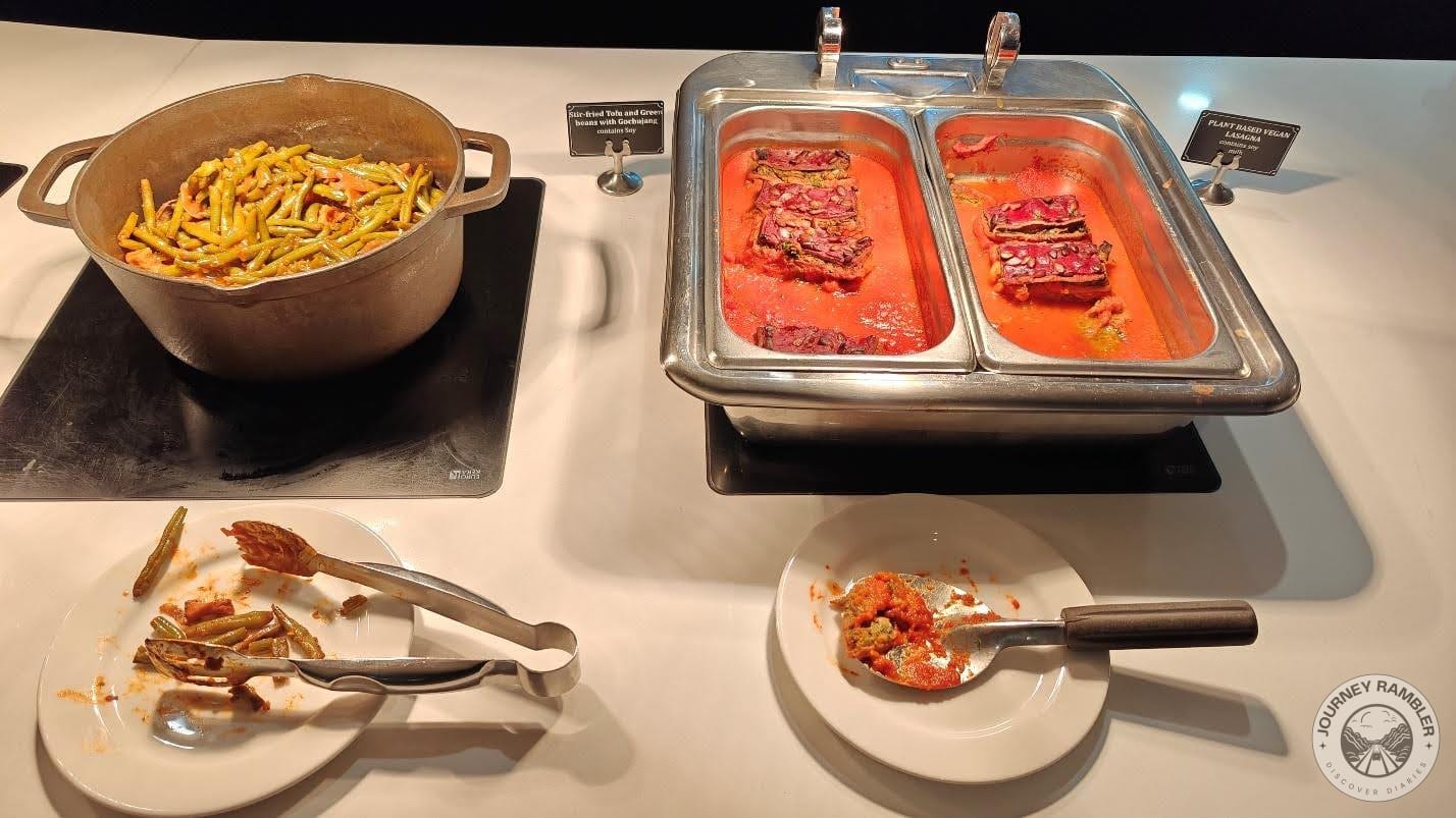 stir-fried green beans and tofu and a plant-based lasagna