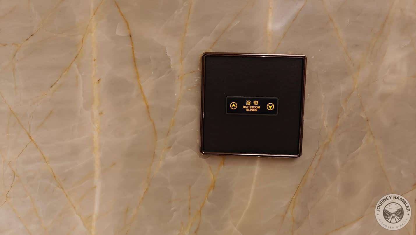 switch to raise or lower the bathroom blinds