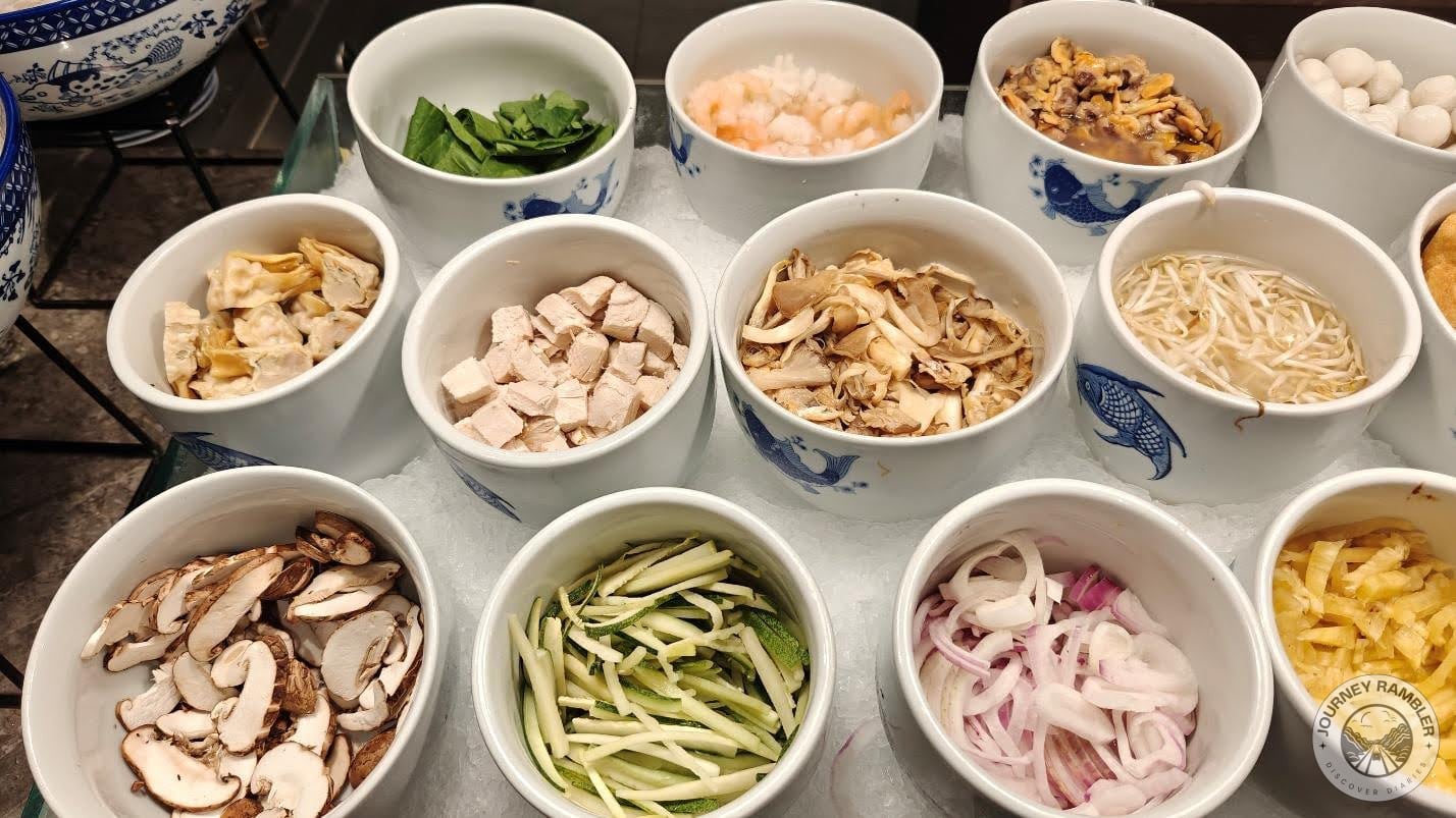 toppings like mushroom, tofu, bean sprouts and green onions