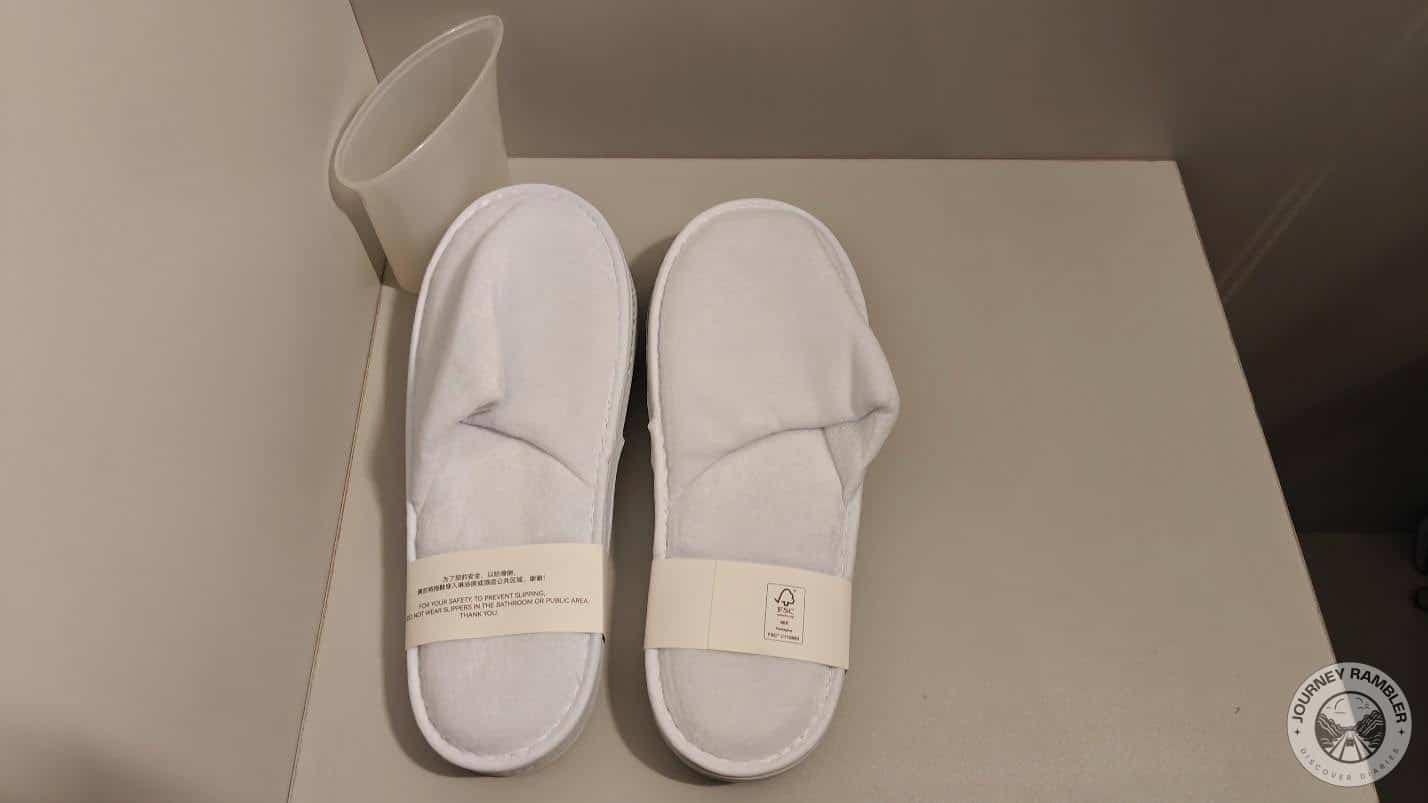 two pairs of soft, warm bedroom slippers