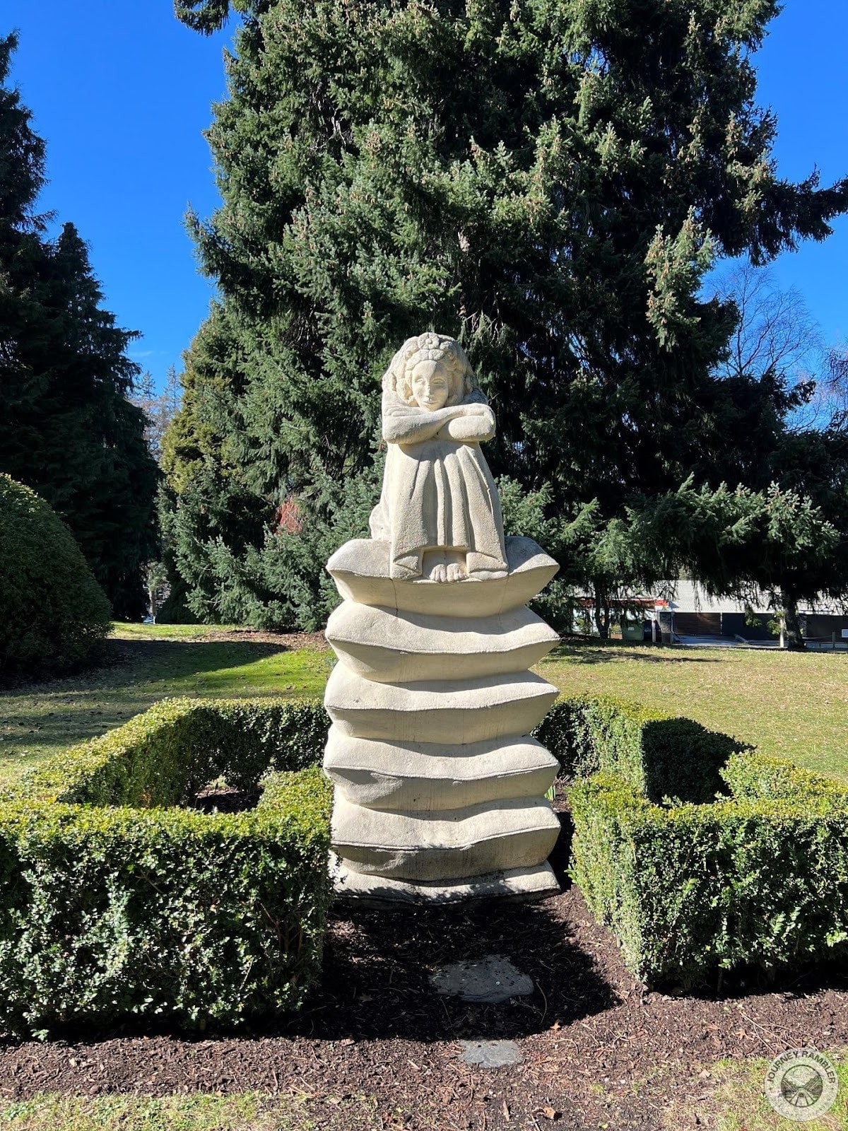 very interesting statue of a young woman