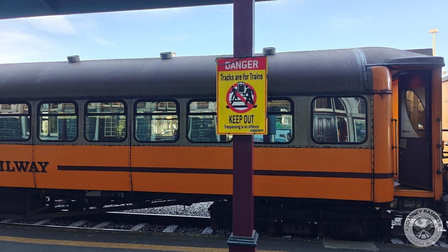 warning sign informing visitors to not step on the tracks