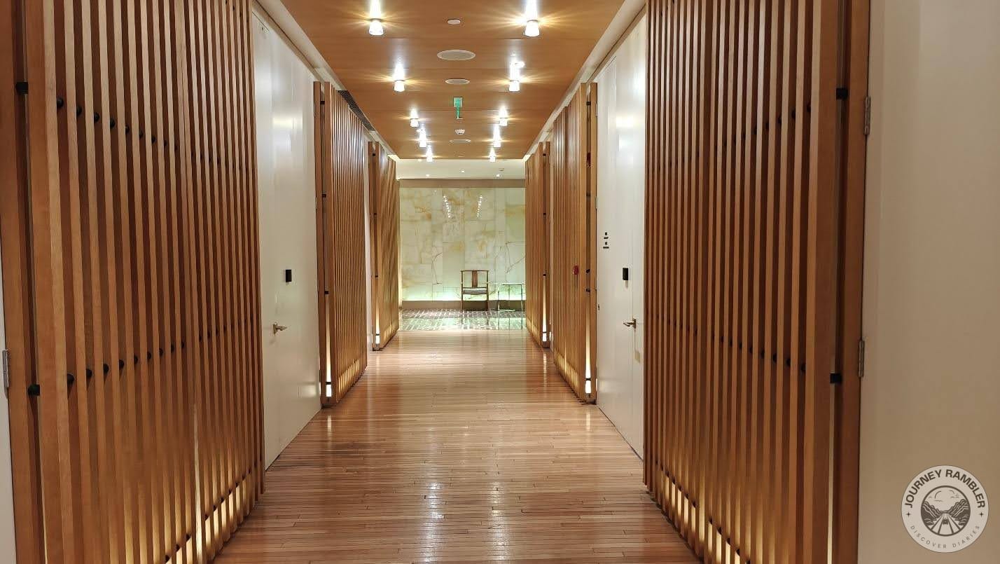 wooden floors and decorative wooden panels on the walls