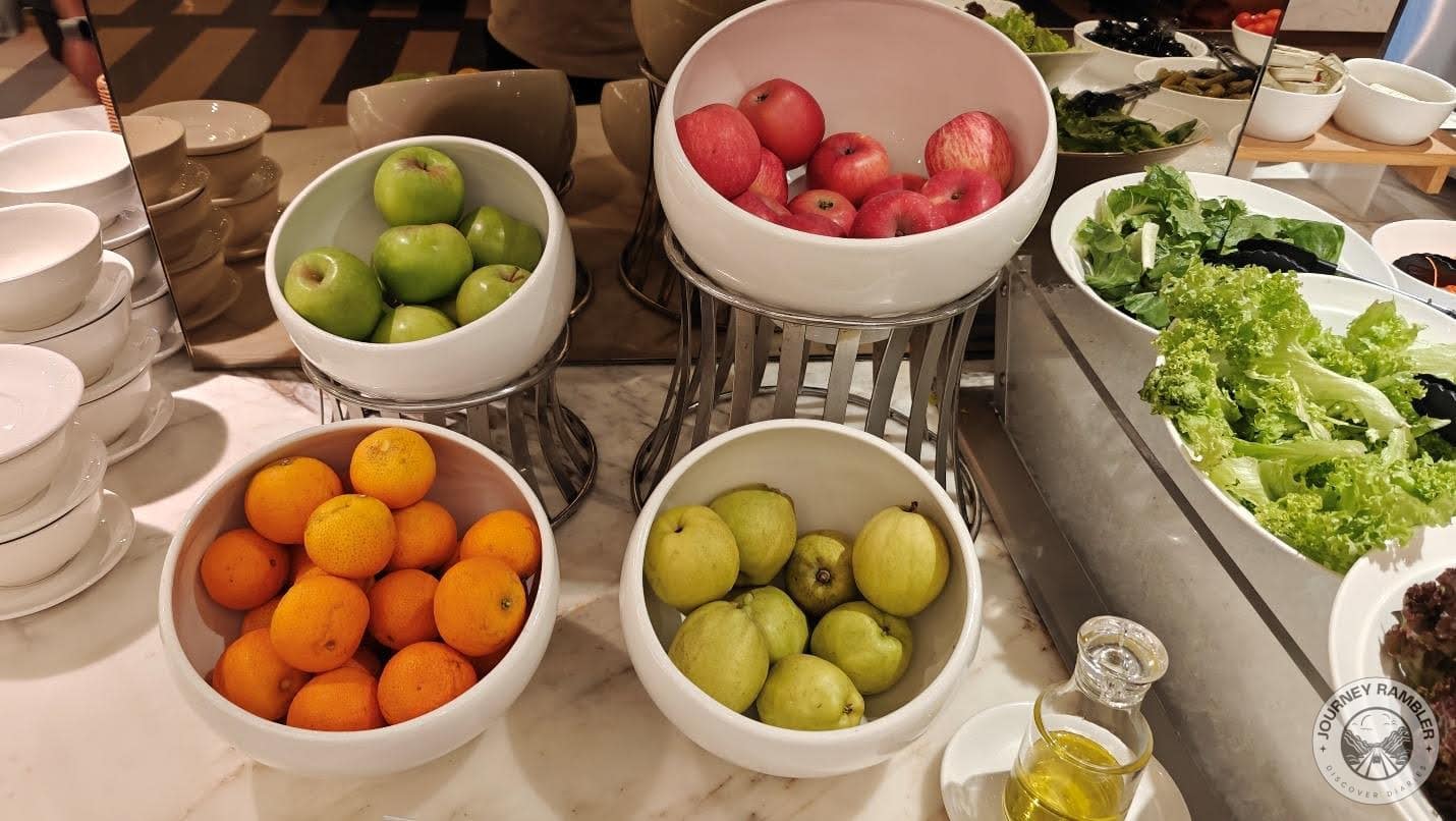 Fresh fruits like oranges and apples