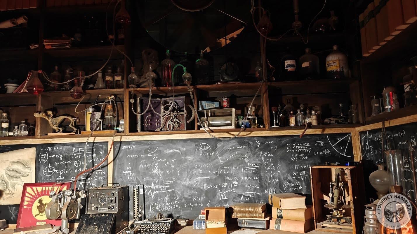 Machines with gears and wires and blackboards with math equations on them crowded one room