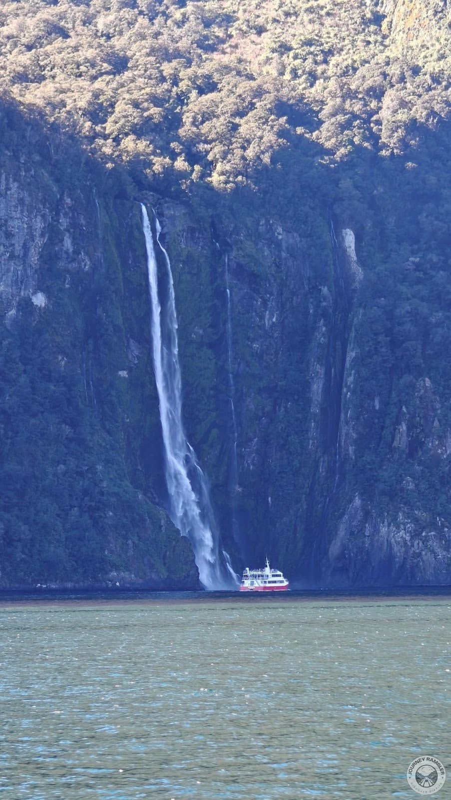 Stirling Falls dwarfing another touring boat