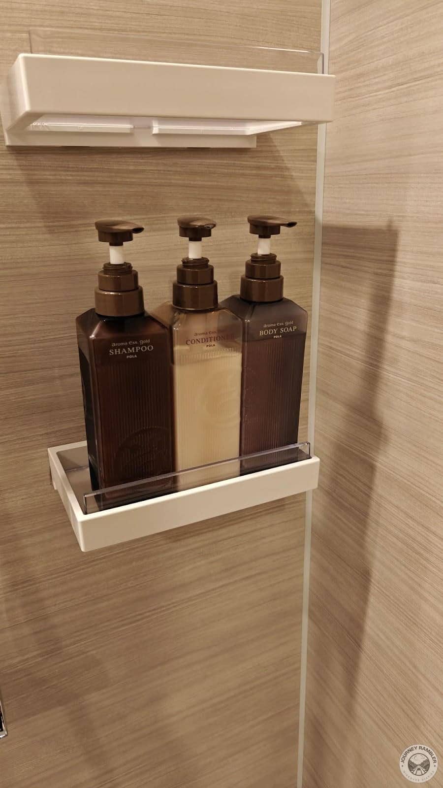 bottles of shampoo, conditioner and body wash