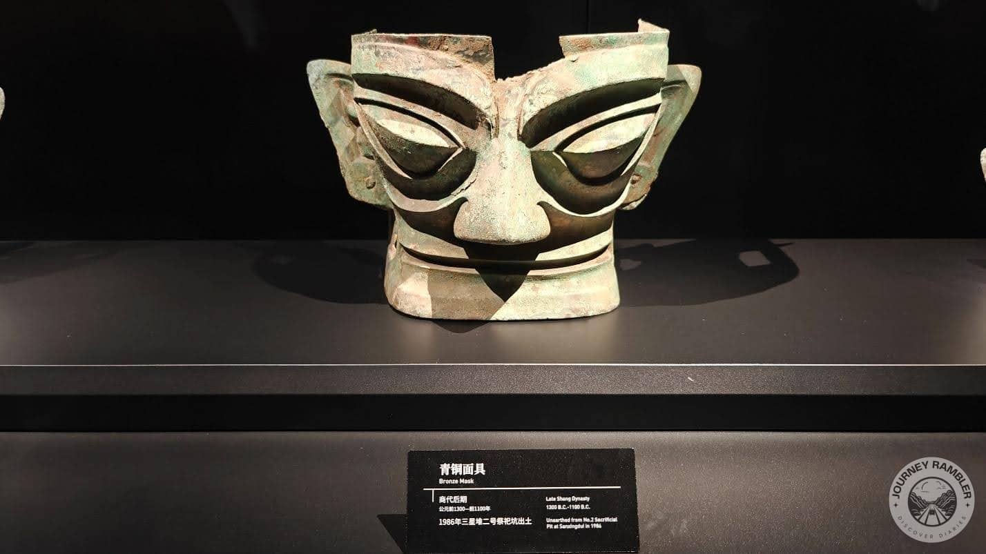 bronze sculpture of a face