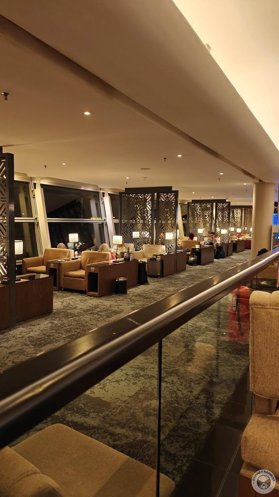 grouped seating areas with large sofas and coffee tables