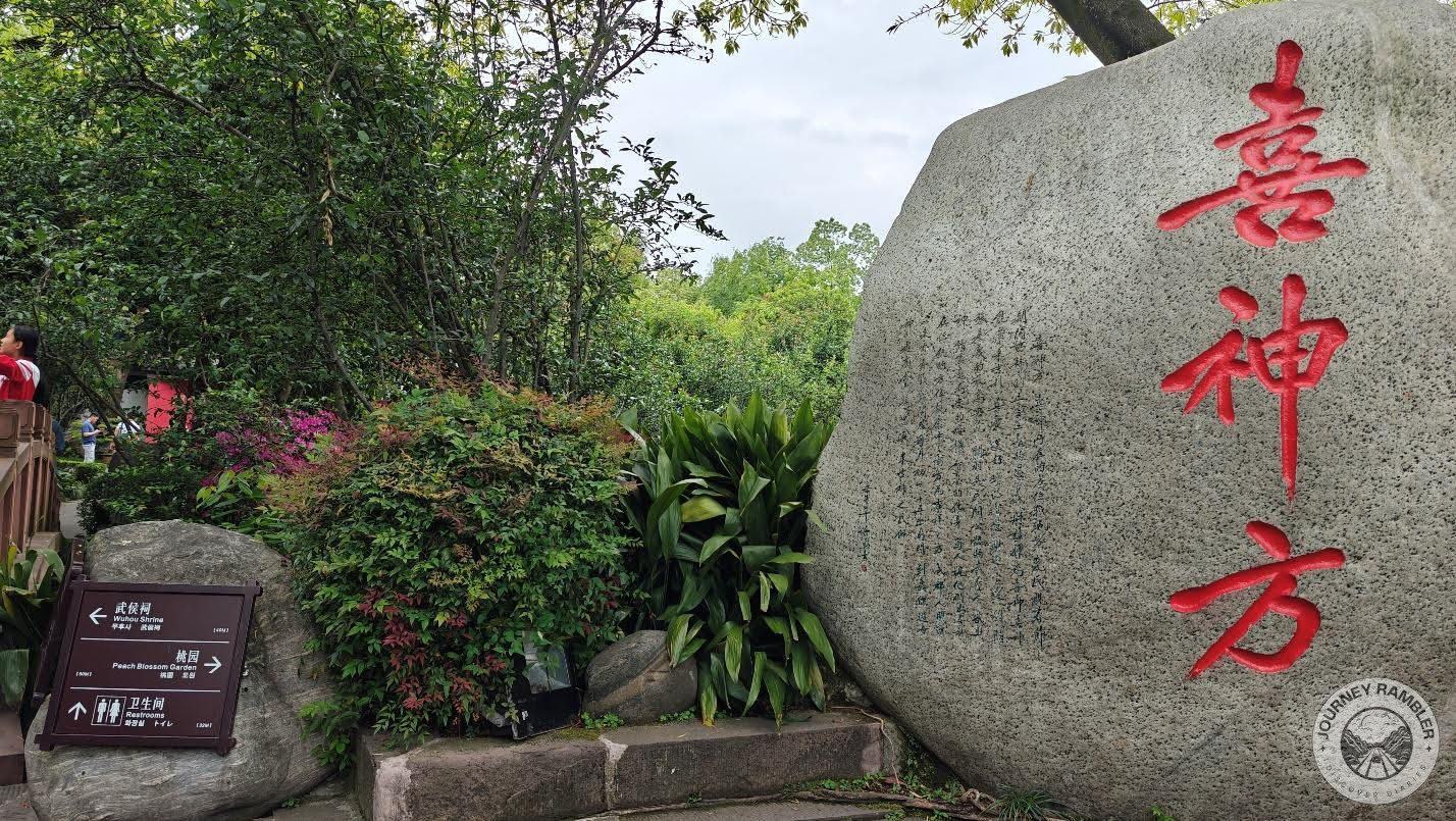 huge stone with large inscriptions in red