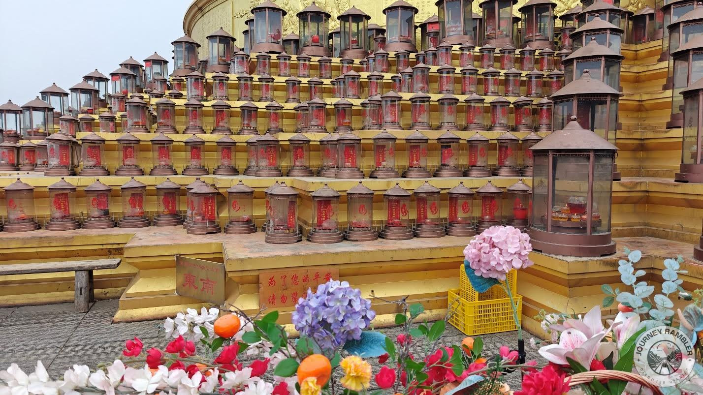 lanterns found on the steps at the statue's base