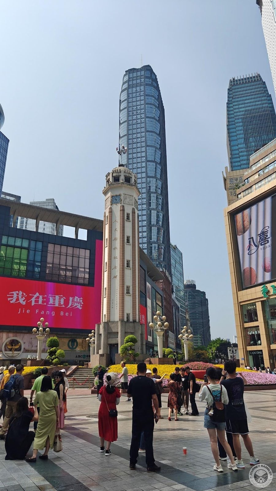monument was dwarfed by all the glass and steel buildings all around it