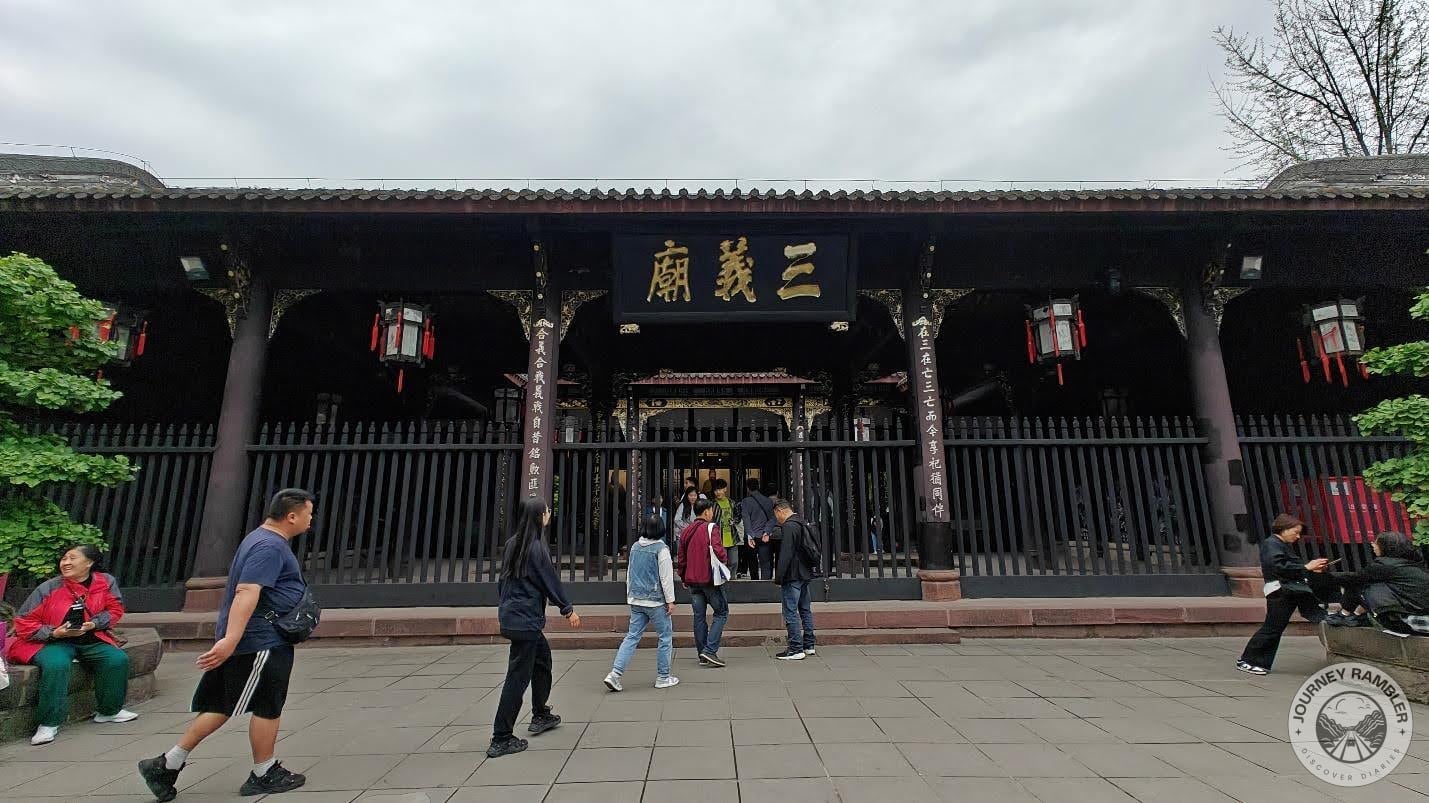 people near entrance to the temple