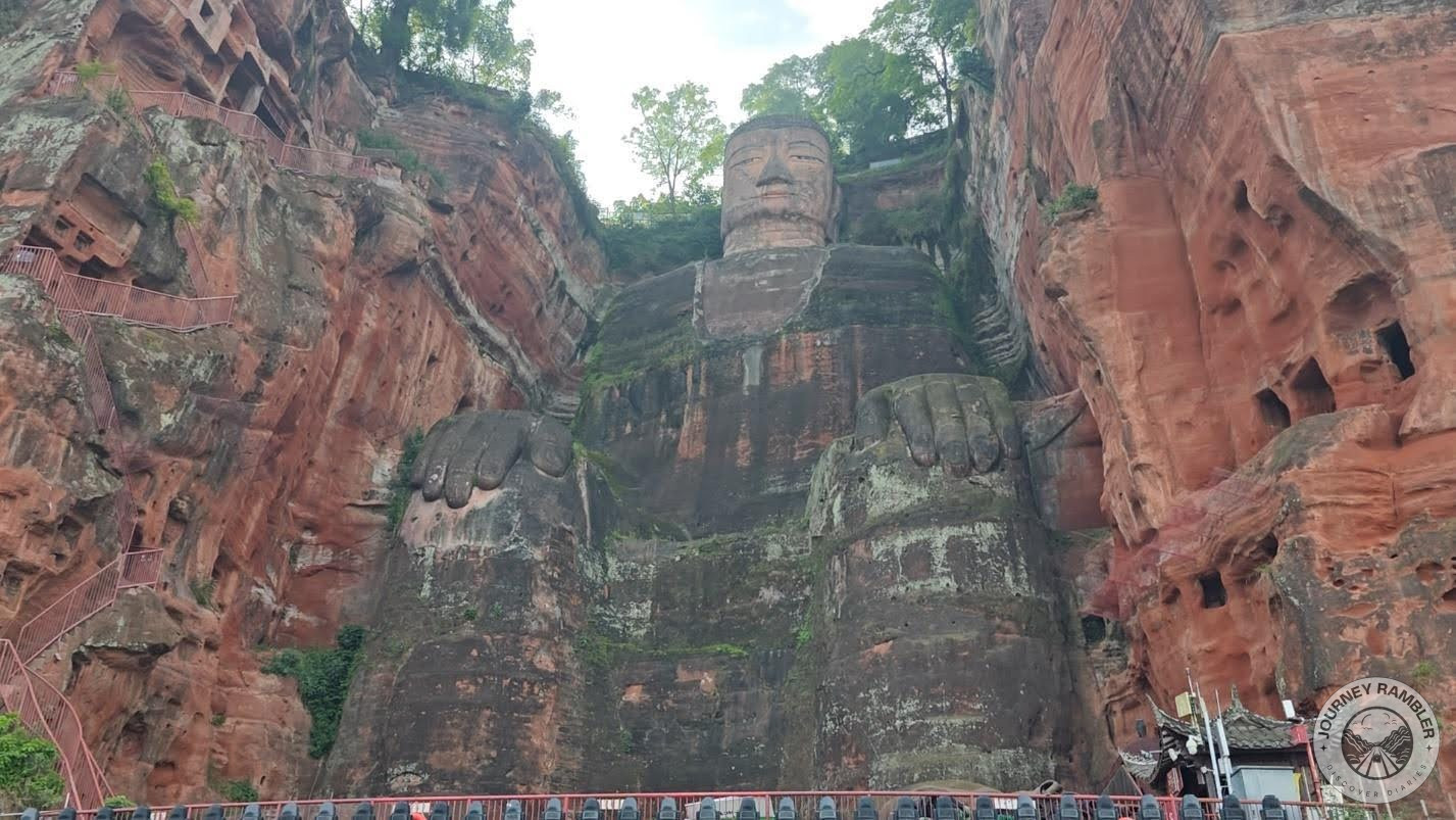 some restorative work is being done on the Buddha