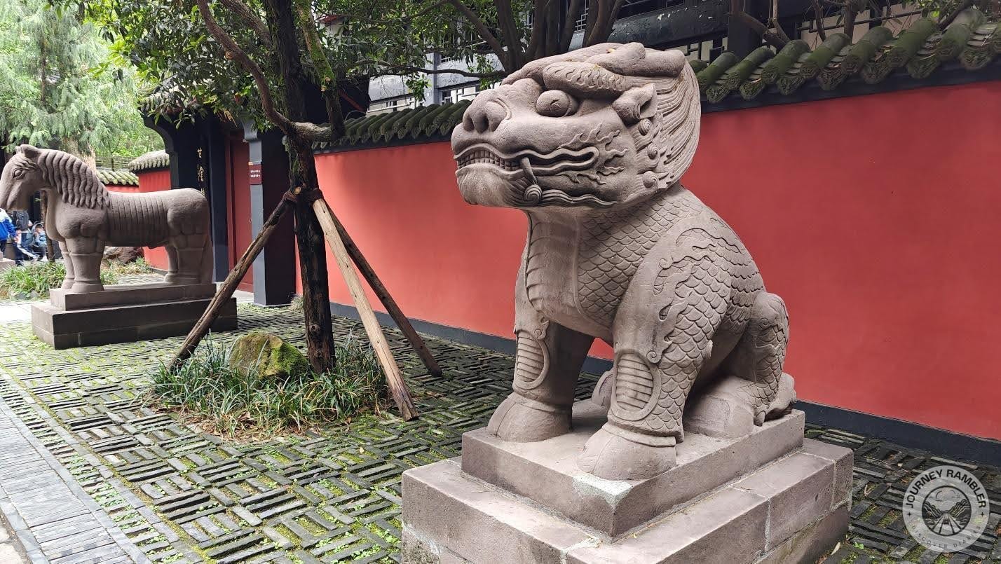 statues of mythical creatures that line the pathway leading to Hui Mausoleum