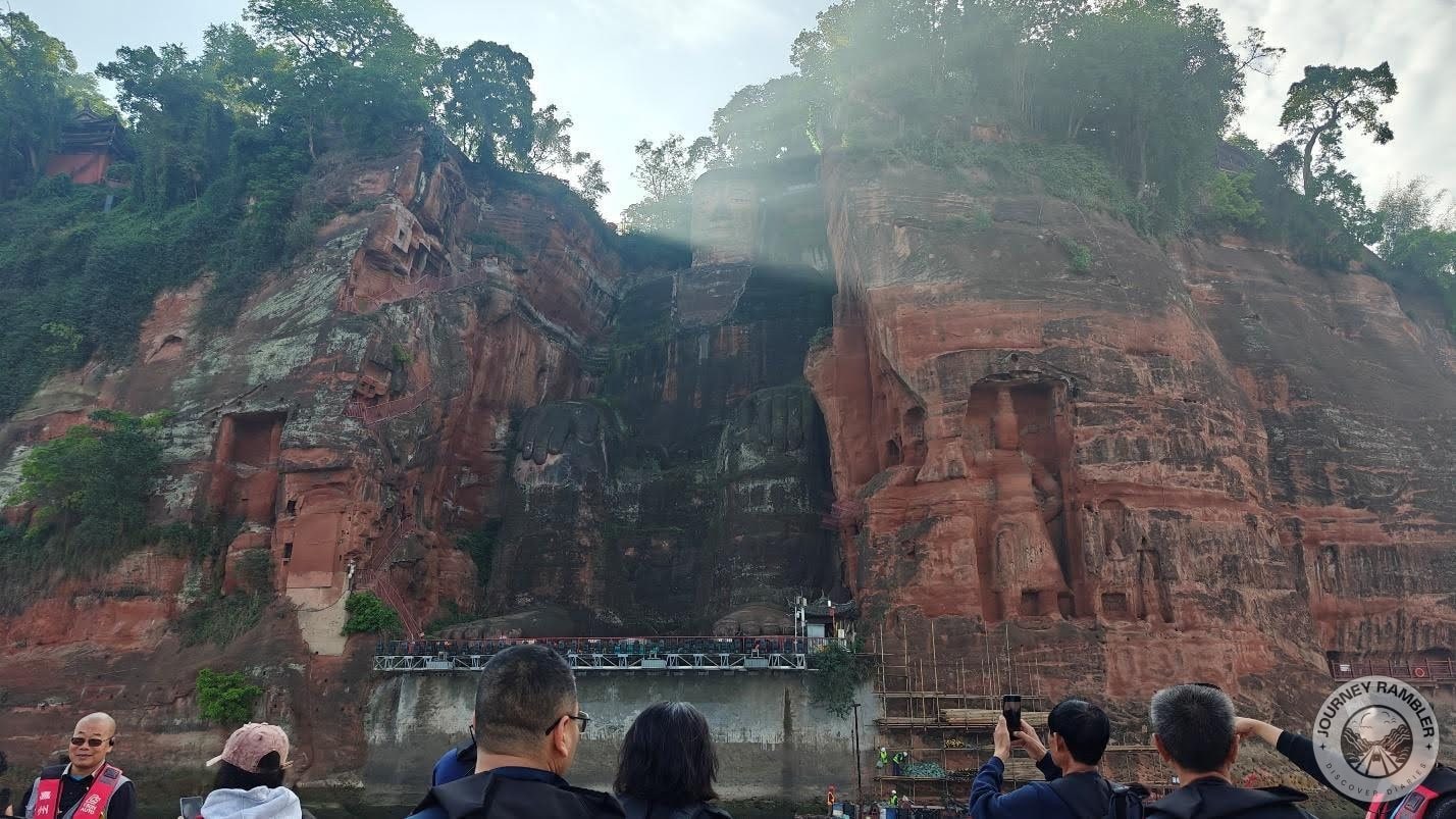 sun illuminating the Buddha’s face