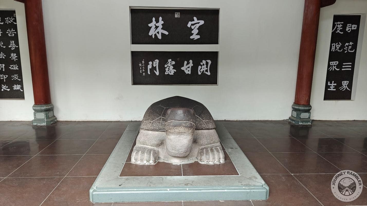 what looks like a worn out statue of a tortoise