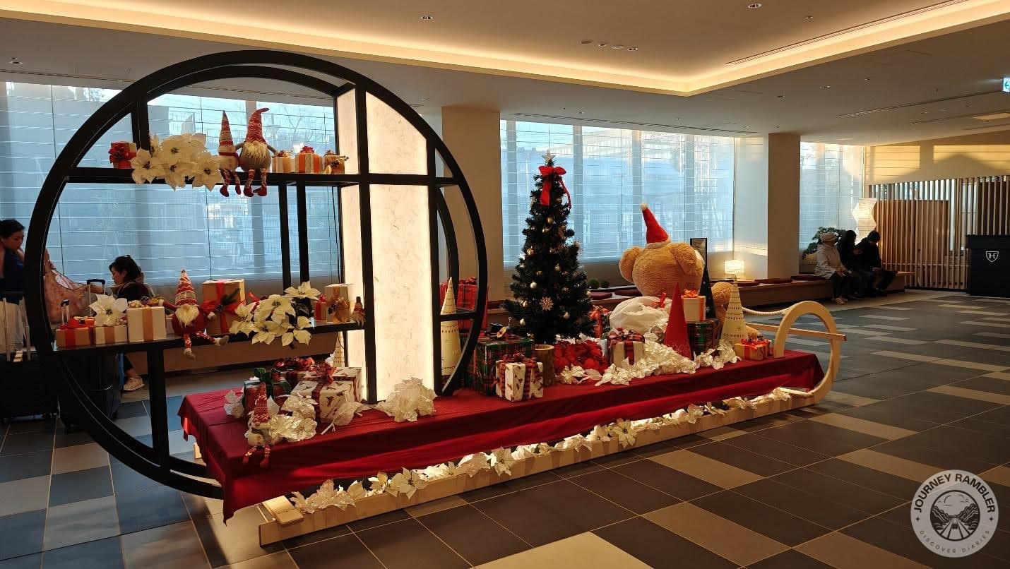 A Christmas tree and a variety of wrapped presents