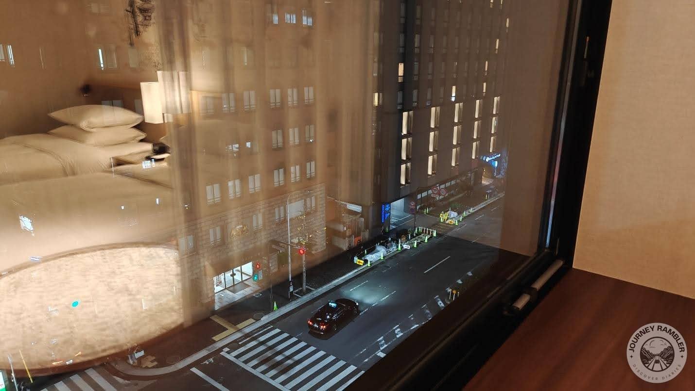 A broad street lay right outside the hotel