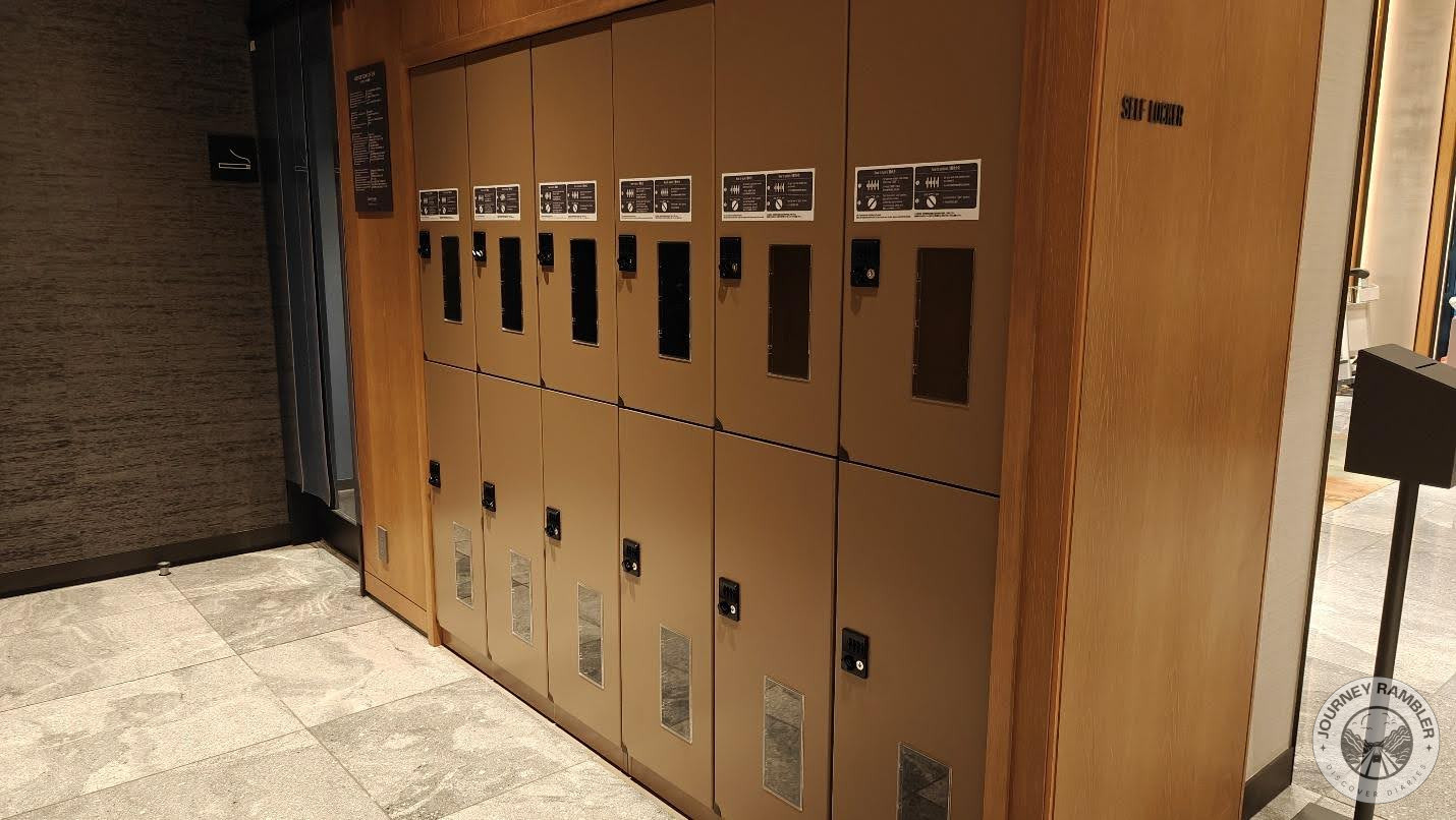 Lockers stood in rows on one side of the lobby
